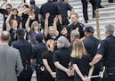Crowds of activists are arrested after they rushed past barriers and protested from the steps of the Capitol before the confirmation vote on President