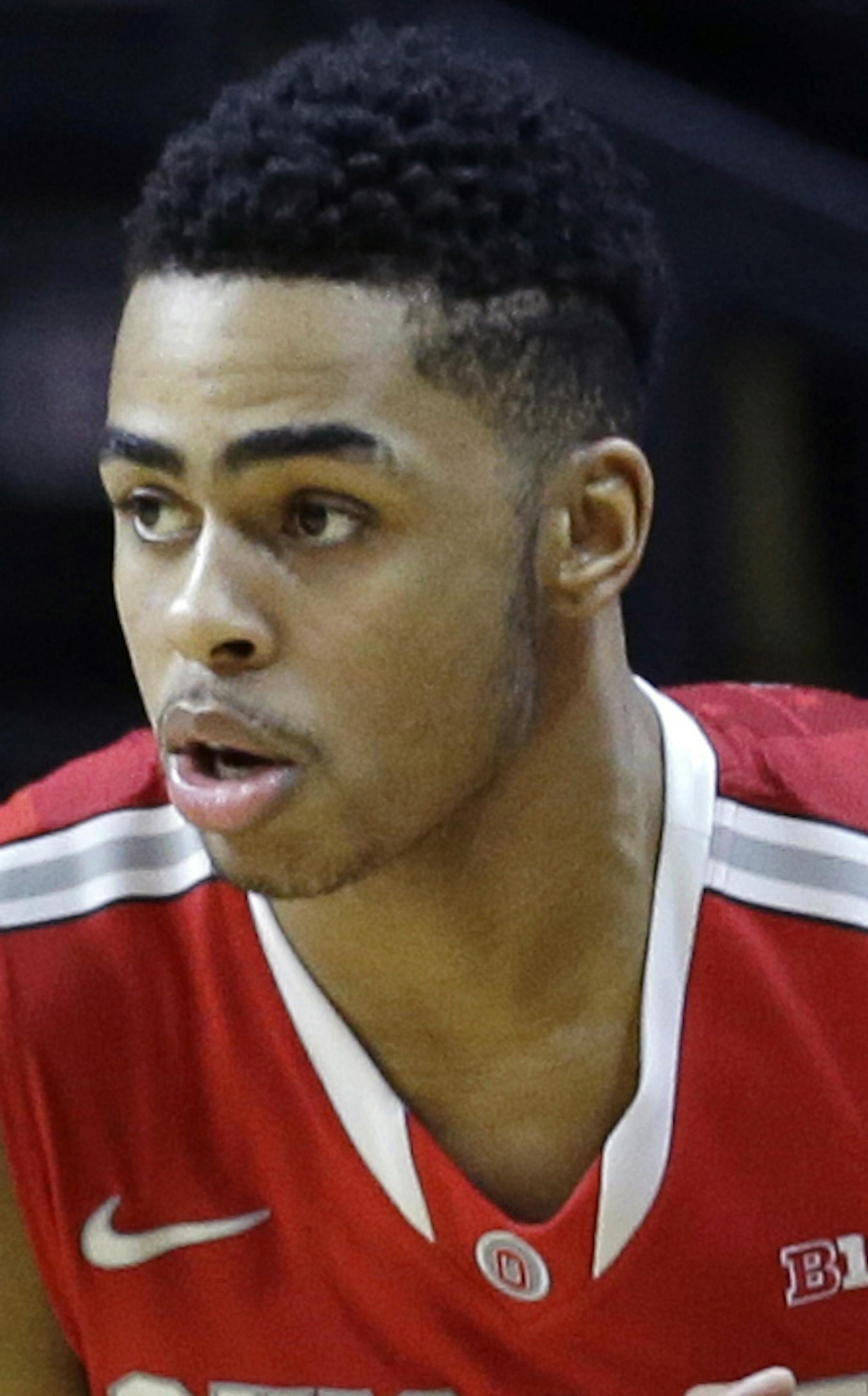 FILE - This Sunday, Feb. 8, 2015, file photo shows Ohio State guard D'Angelo Russell dribbling the ball during the second half of an NCAA college basketball game against Rutgers in Piscataway, N.J. Russell, a 6-foot-5 native of Louisville, is considered a likely candidate for a one-and-done season at Ohio State since several mock drafts have him going in the top five picks, if not No. 1 overall. (AP Photo/Mel Evans, File)