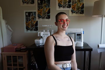 Local clothing designer Maxine Britt who's putting a new spin on gender neutral clothing, bringing in vivid colors and fun shapes sat for a portrait i