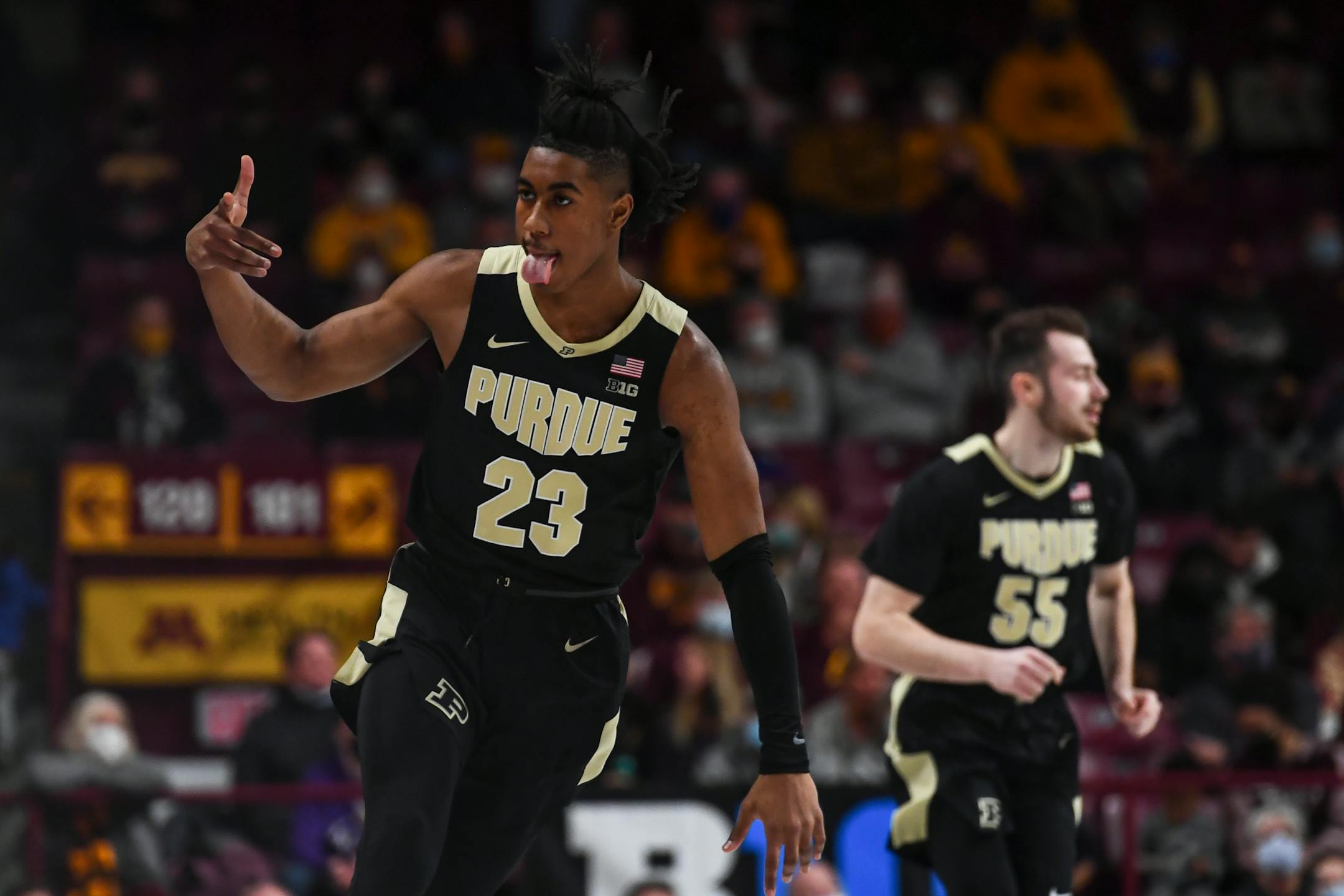 Purdue Boilermakers guard Jaden Ivey (23) celebrates a 3-pointer scored during the first half of an NCAA men's basketball game between Minnesota and Purdue at Williams Arena in Minneapolis, Minn.