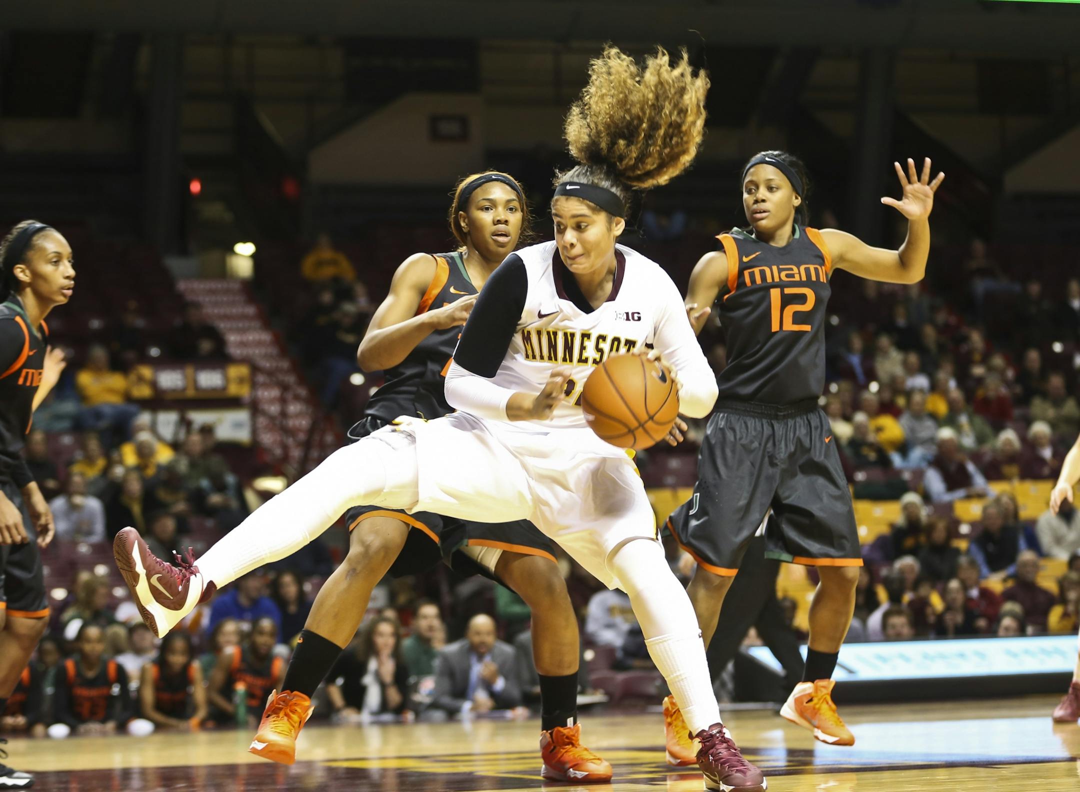 Gopher's #32 Amanda Zahui B. grabbed a rebound in the first half of a basketball game between the Minnesota Gophers and Miami on Thursday, December 5, 2013, at Williams Arena at the University of Minnesota in Minneapolis, Minn.