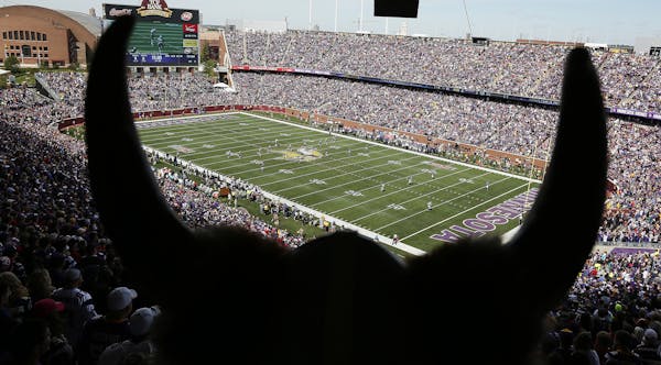 Vikings fans stood during the home opening kickoff at TCF Bank Stadium. The Minnesota Vikings hosted the New England Patriots at TCF Bank Stadium Sund