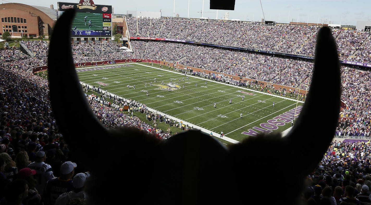 Vikings fans stood during the home opening kickoff at TCF Bank Stadium. The Minnesota Vikings hosted the New England Patriots at TCF Bank Stadium Sunday September 14 , 2014 in Minneapolis , MN. ] Jerry Holt Jerry.holt@startribune.com ORG XMIT: MIN1409141535141190