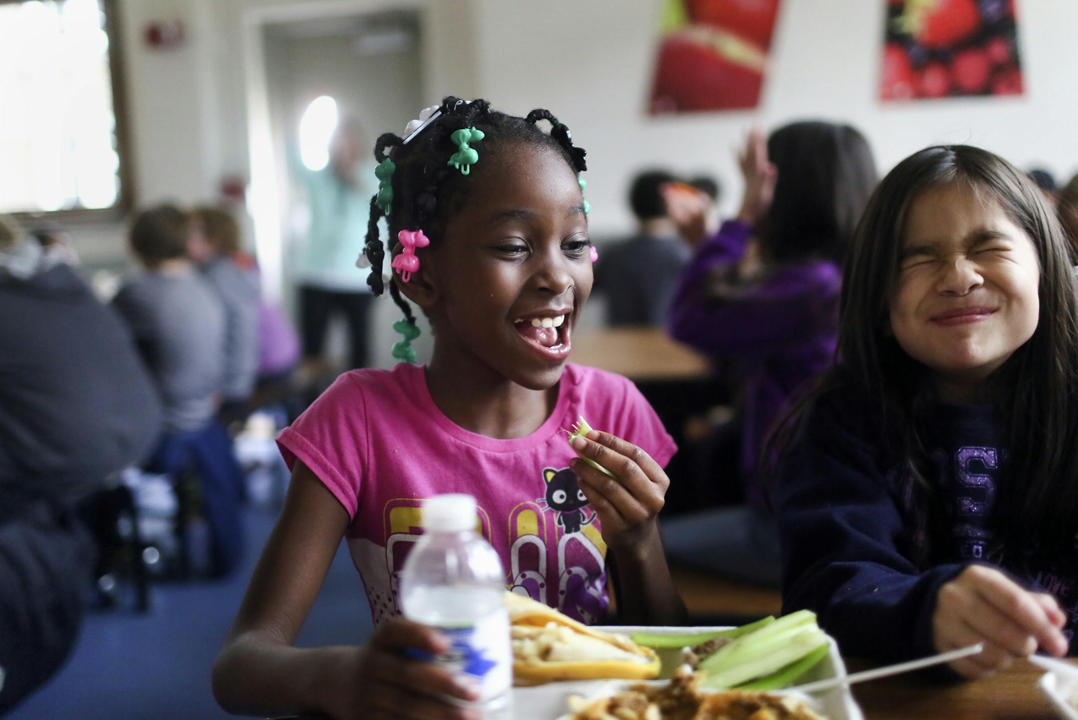 Students at Howe Elementary School, including third graders Victoria Parks, left to right, and Neveah Beaulieu, got to eat a school lunch that included a main entre of beef or been nachos as well as choices of fresh vegetables and fruit Tuesday, May 13, 2014, in Minneapolis, MN.](DAVID JOLES/STARTRIBUNE) djoles@startribune From his perch leading the House education committee, Rep. John Kline is quietly attempting to slow down implementation of new nutritional standards for school lunches. He say
