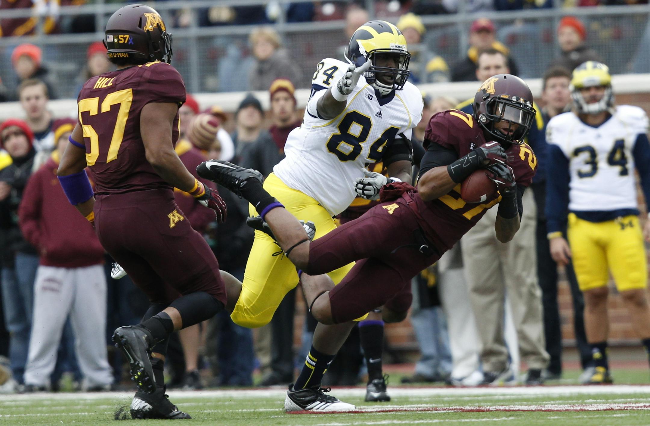Cedric Thompson makes an interception against Michigan in a game Nov. 3, 2012. Photo courtesy of the University of Minnesota