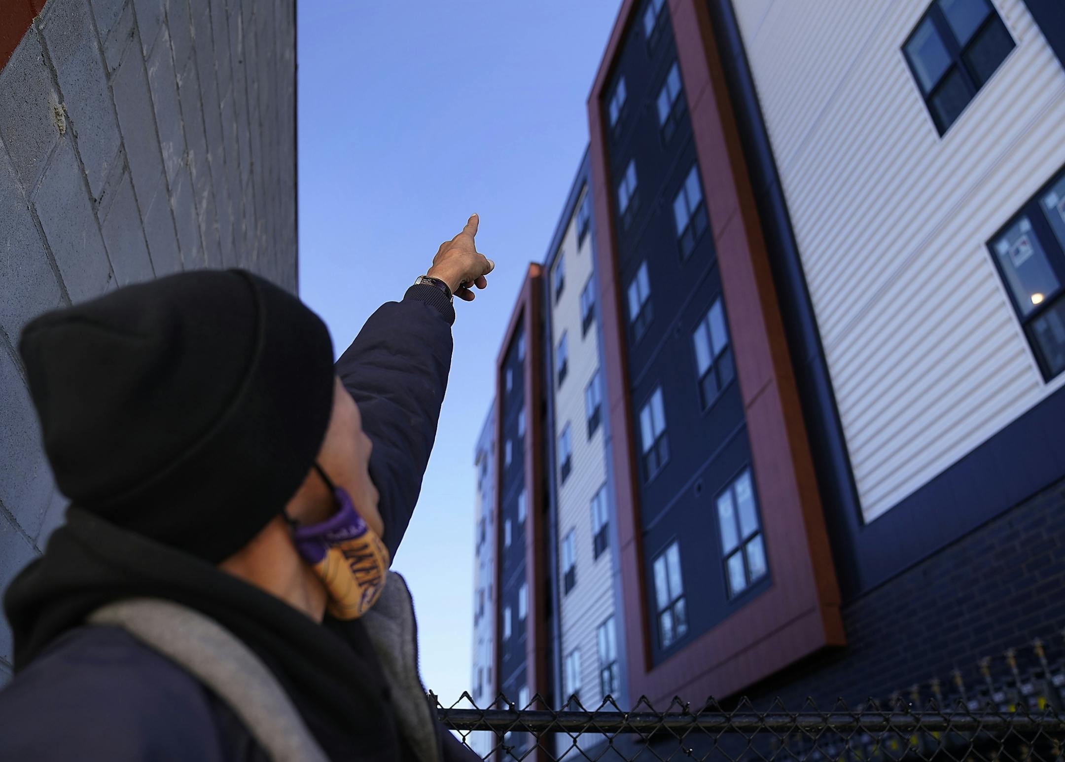 Allen Touche, 48, excitedly pointed to the 6th floor of the new, yet to open Red Lake Nation apartment complex recently. He stopped there recently on his weekly Saturday journey to help feed homeless Natives and others in Minneapolis. The low-rent complex targeted specifically to Native Americans is located across from the Wall of Forgotten Natives, where last summer Touche lived in a tent. Touche, after many attempts, got a job working construction at the couplex called Mino-bimaadiziwin, in Oj