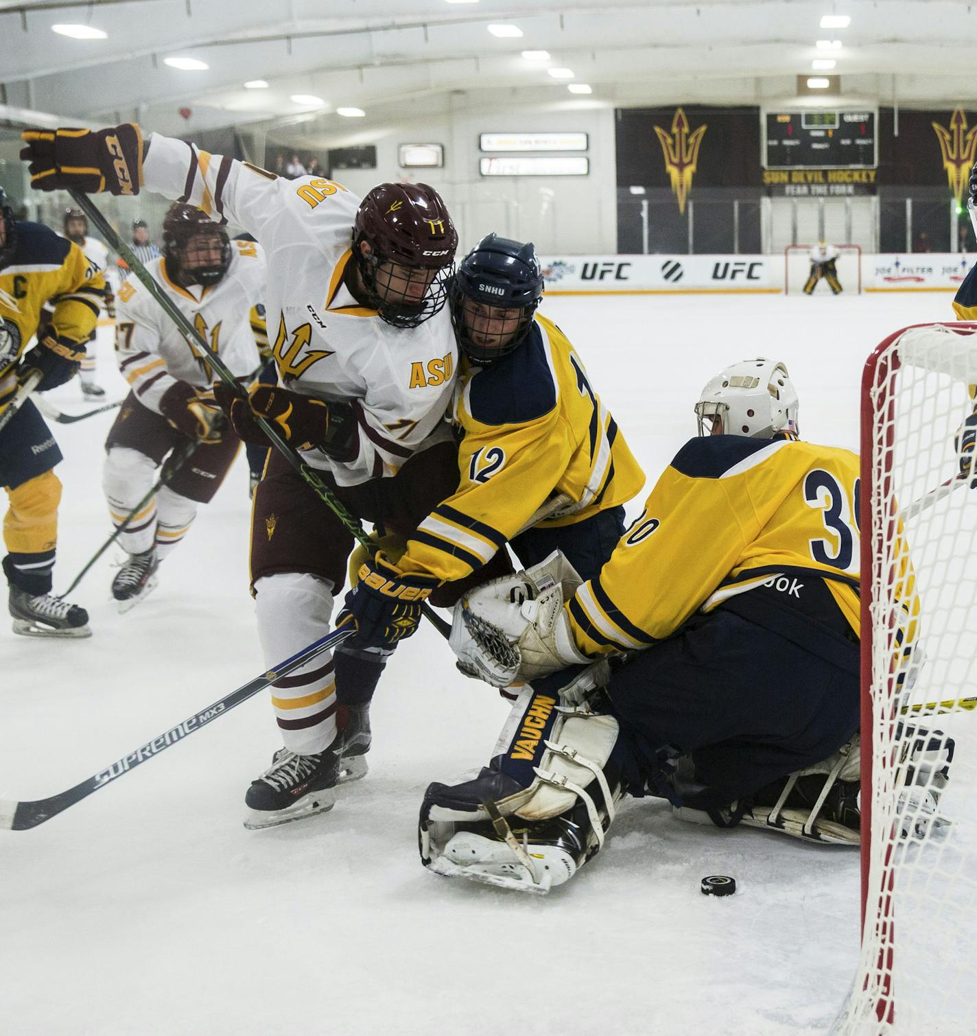 Arizona State freshman forward Jack Rowe scores in a home game against Southern New Hampshire at Oceanside Ice Arena in Tempe, Ariz., Oct. 23, 2015. The Sun Devils, one of two teams at the top level of collegiate hockey in the southern United States, is accumulating experience and a lot of travel miles. (Deanna Alejandra Dent/The New York Times)