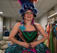 Children's Theatre Company's Andi Soehren tightened a corset onto actor Autumn Ness as they got ready in the dressing room for a dress rehearsal for t
