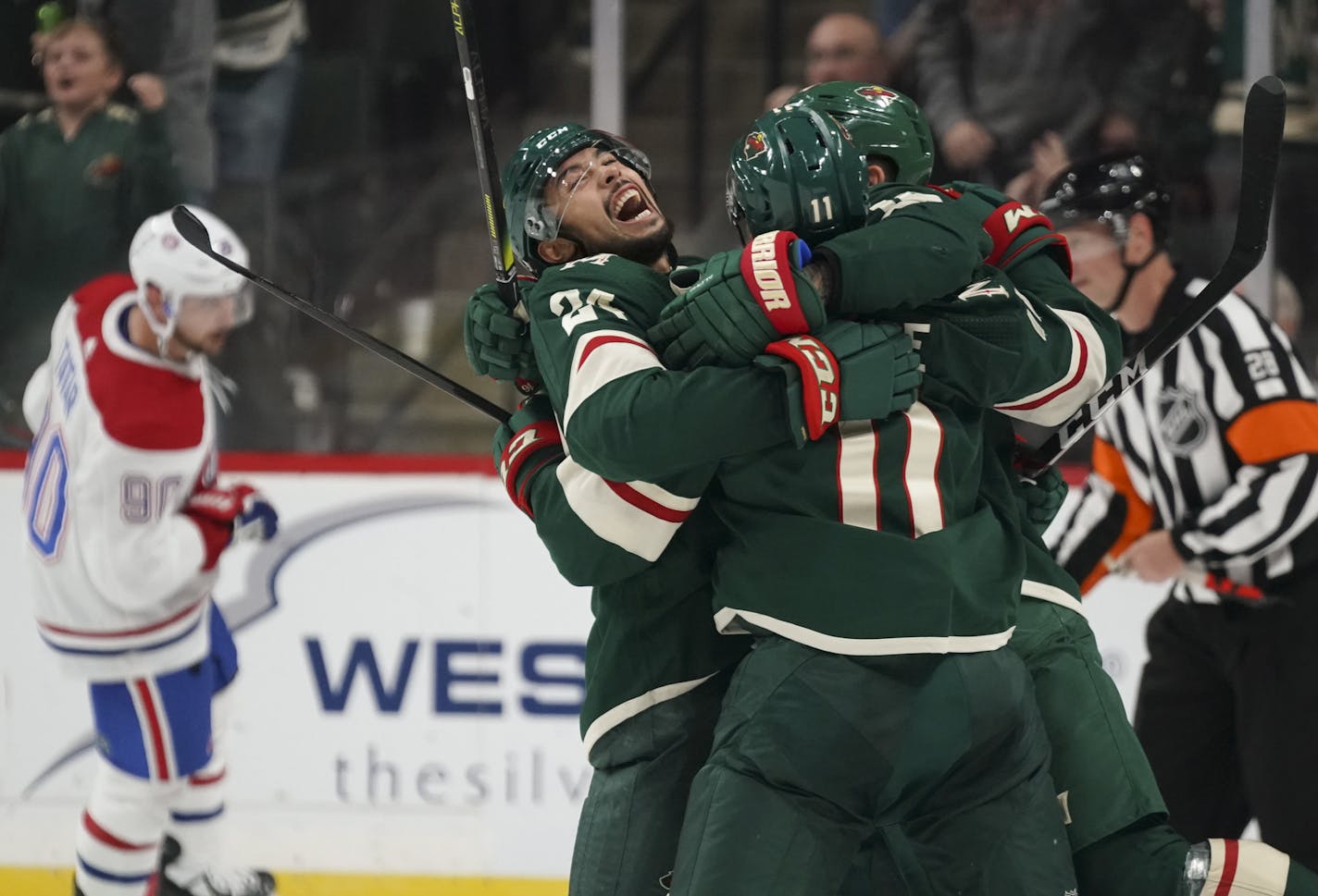 Minnesota Wild defenseman Matt Dumba (24) and left wing Jason Zucker (16) celebrated with Zach Parise (11) after he scored what proved to be the game winner in the third period. ] JEFF WHEELER &#x2022; Jeff.Wheeler@startribune.com The Minnesota Wild defeated the Montreal Canadiens 4-3 in an NHL hockey game Sunday afternoon, October 20, 2019 at Xcel Energy Center in St. Paul.