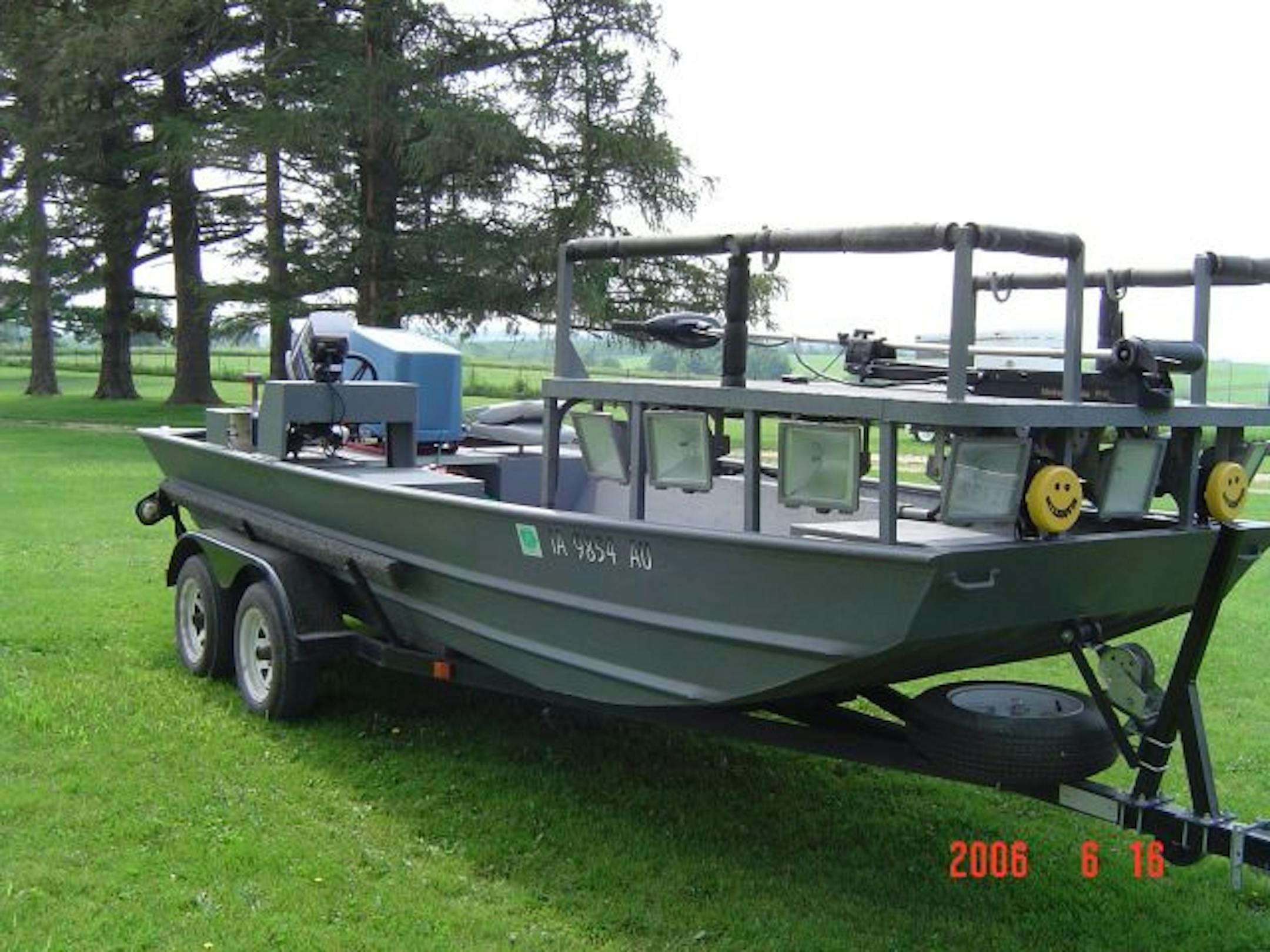 Bowfishing rigs offer platforms across the bow for archers to gain stable footing while shooting. The powerful lights, aimed at the water, are powered by an on-board generator.