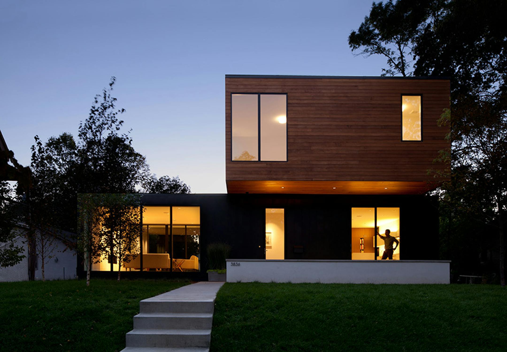 Sheridan Residence. A new modern home in an established urban neighborhood honors the scale of existing homes, by Peterssen/Keller Architecture.