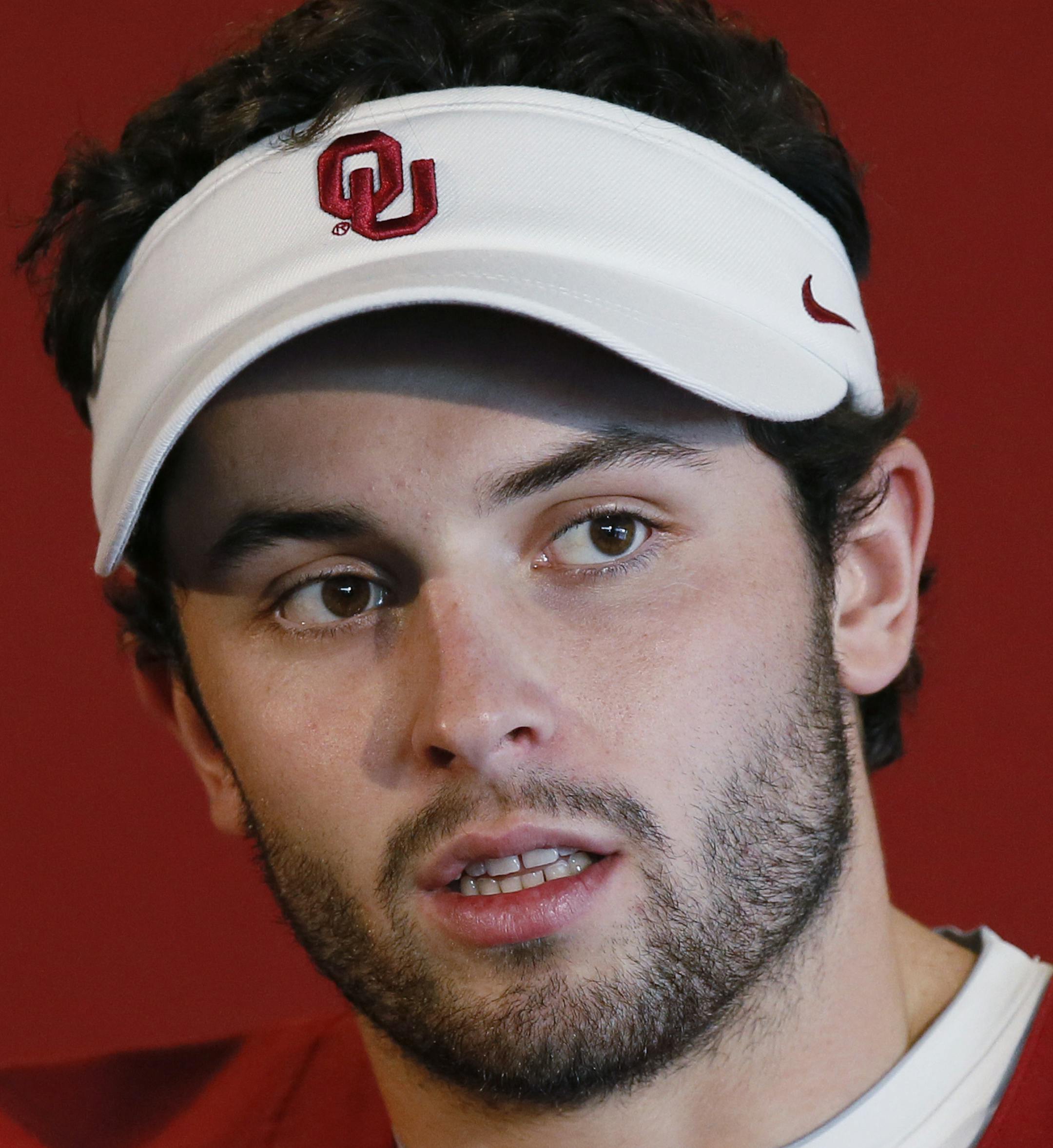 FILE - In a Saturday, Aug. 6, 2016 file photo, Oklahoma quarterback Baker Mayfield talks to the media during an NCAA college football media day in Norman, Okla. Mayfield made his name as an underdog with something to prove. Now, he's bound for New York as a Heisman finalist. (AP Photo/Sue Ogrocki, File)