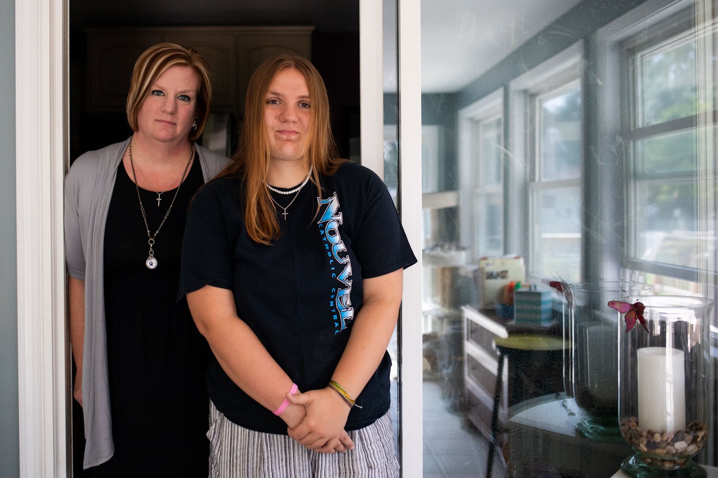 Cara Schade with her daughter, Lydia, a senior at Nouvel Catholic Central High School. MUST CREDIT: Photo for The Washington Post by Emily Elconin