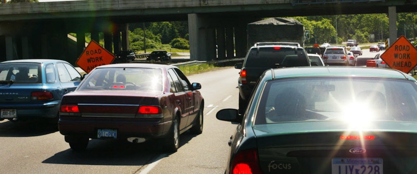 Traffic comes to a slow roll on Crosstown Hwy. 62 near a road construction project in Edina.