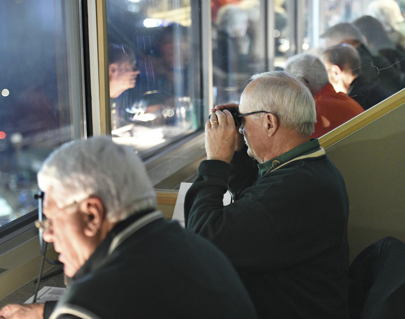 In this Saturday, Nov. 19, 2016, photo, Donn Hopkins volunteers in the press box at Hughes Stadium during an NCAA college football game in Fort Collins, Colo. Hopkins also volunteers with the Fort Collins Museum of Discovery, and sings with the Silvertones, a group of about 150 older singers. Hopkins likes the flexibility retirement offers. He and his wife Linda plan to travel more throughout the U.S., visiting family and friends. (Valerie Mosley/The Coloradoan via AP)