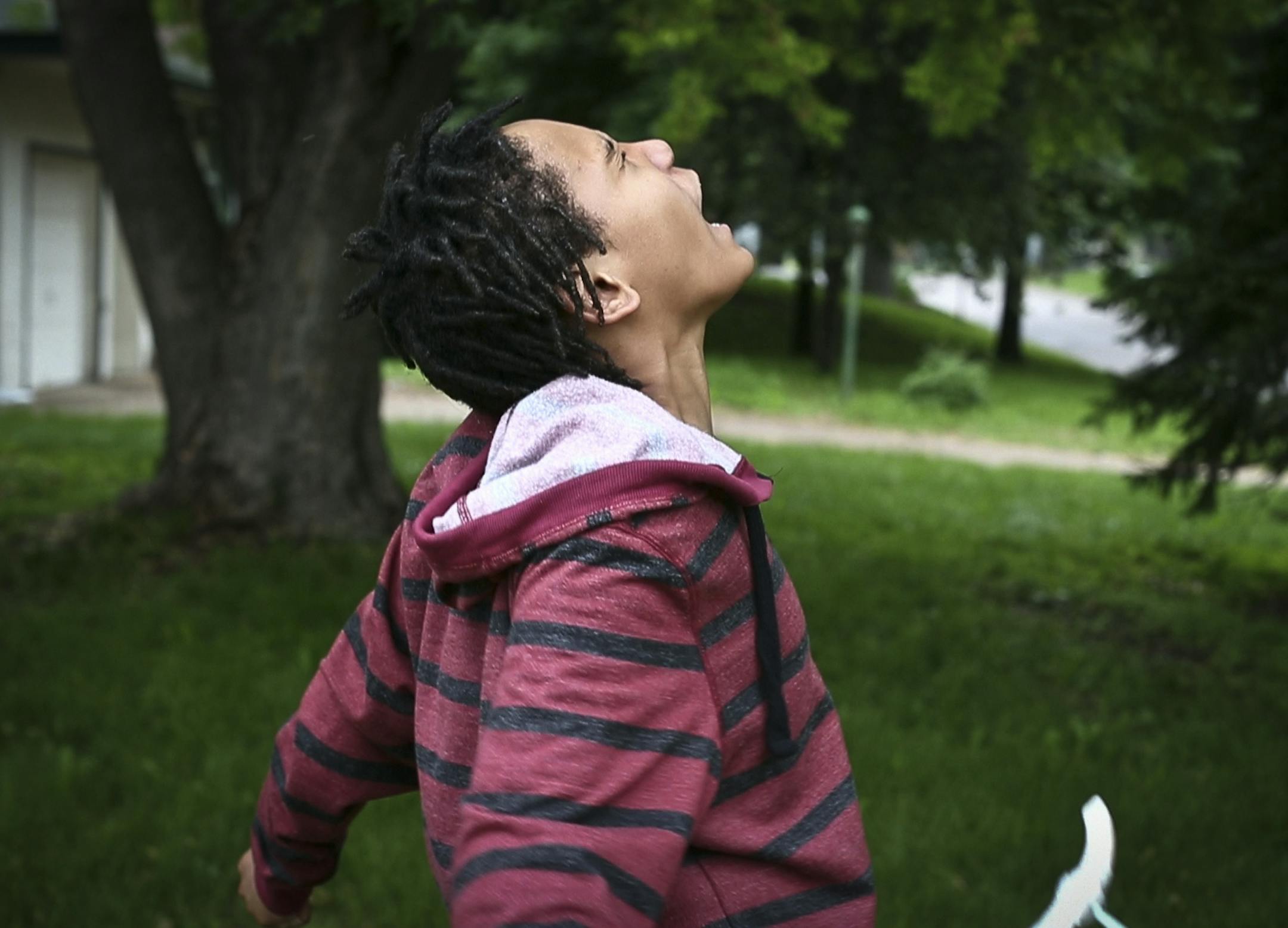 Gianni Griffin-Davis did an imaginary play where he "changed souls" outside his house after school on Wednesday, June 12, 2013. ] (RENEE JONES SCHNEIDER * reneejones@startribune.com)