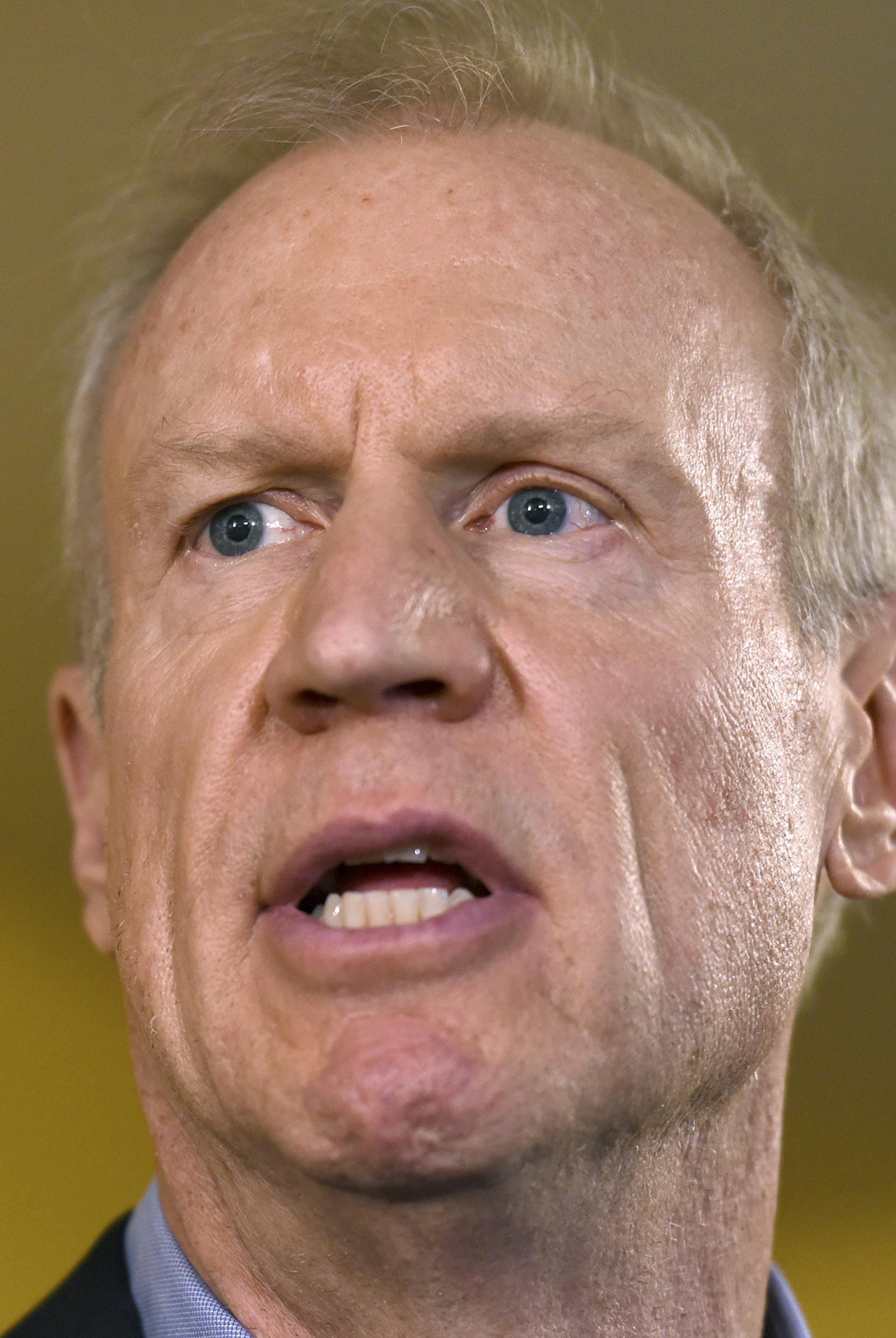 FILE - In this July 5, 2017, file photo, Illinois Gov. Bruce Rauner speaks during a news conference, in Chicago. The 2018 Illinois governor's race is on pace to be the most expensive in U.S. history, propelled by a wealthy Republican incumbent and a billionaire Democrat. J.B. Pritzker, one of the world's richest people, is among several Democrats trying to defeat multimillionaire Rauner. (AP Photo/G-Jun Yam, File)