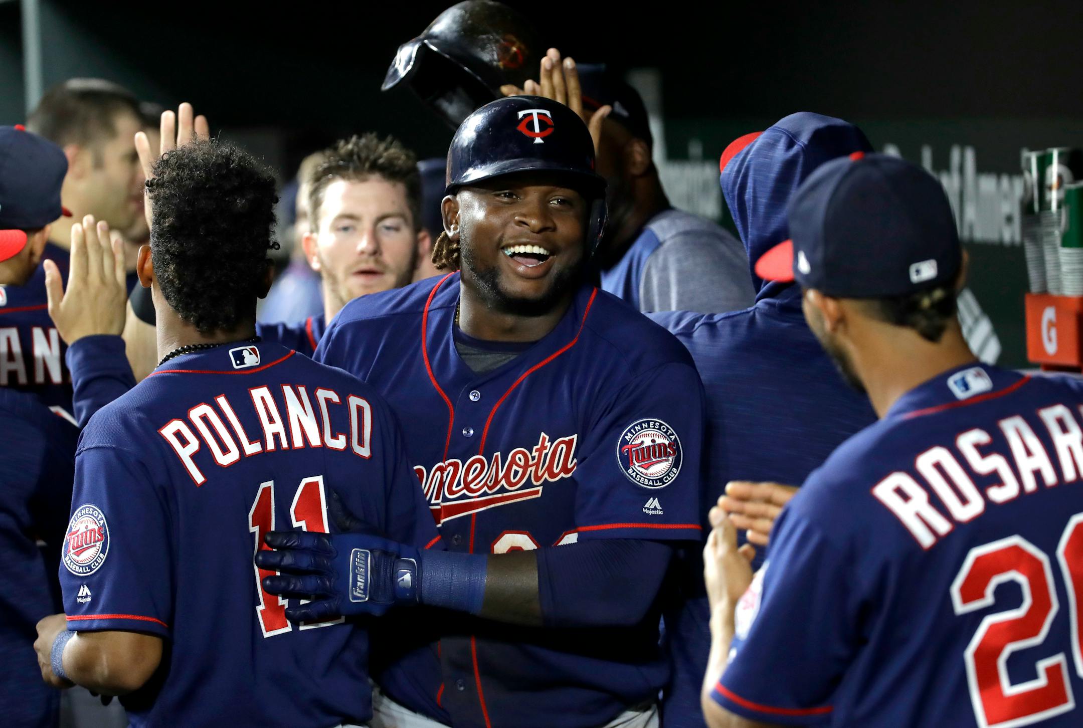 Minnesota Twins' Miguel Sano celebrates his two-run home run with teammates in the dugout in the ninth inning of a baseball game against the Baltimore Orioles in Baltimore, Monday, May 22, 2017. Minnesota won 14-7. (AP Photo/Patrick Semansky)