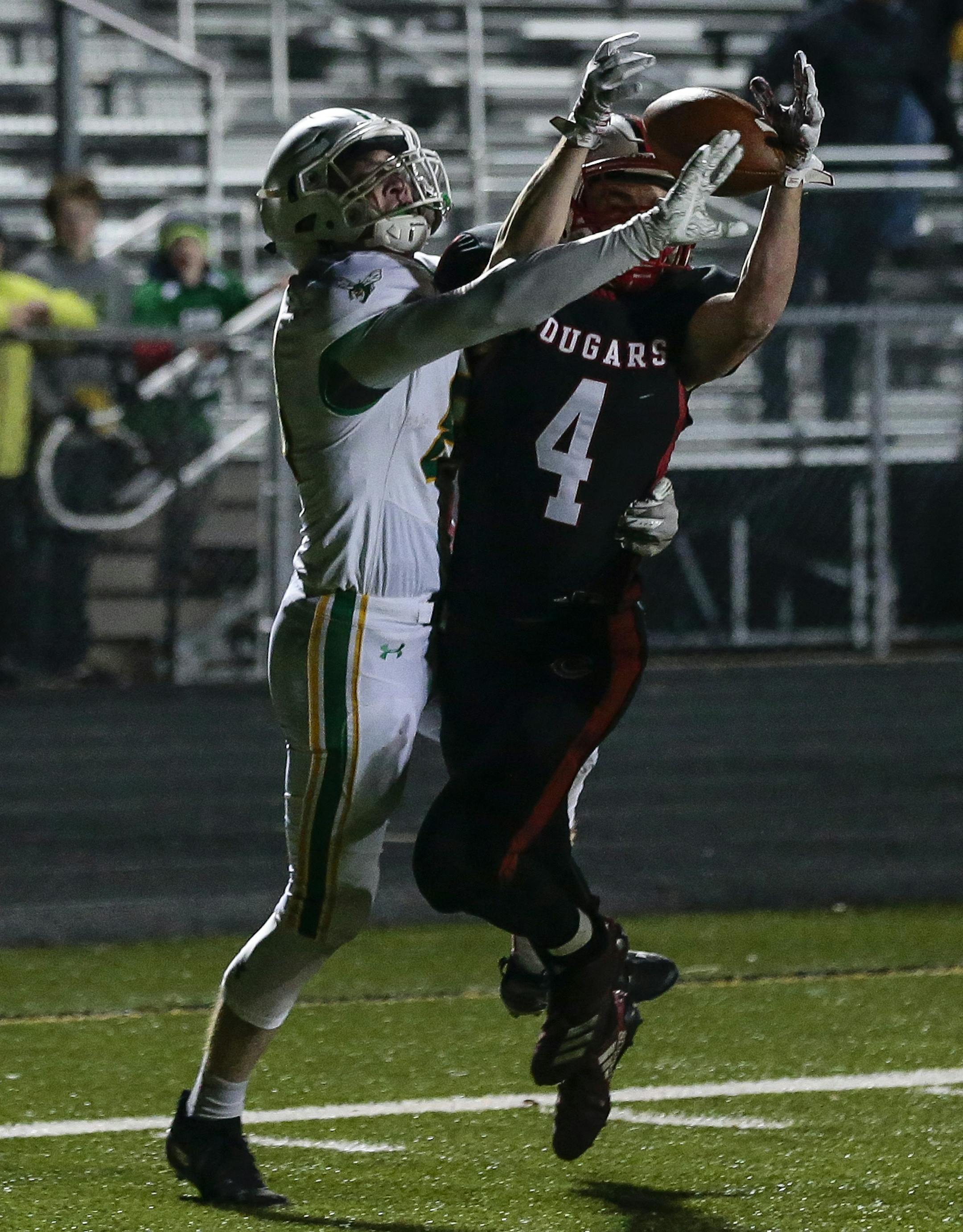 Timothy O'Neill Jr. (4) stops an Edina scoring drive with an interception at the goal line with under 30 remaining in regulation, sending the game into overtime. Photo by Cheryl A. Myers, SportsEngine
