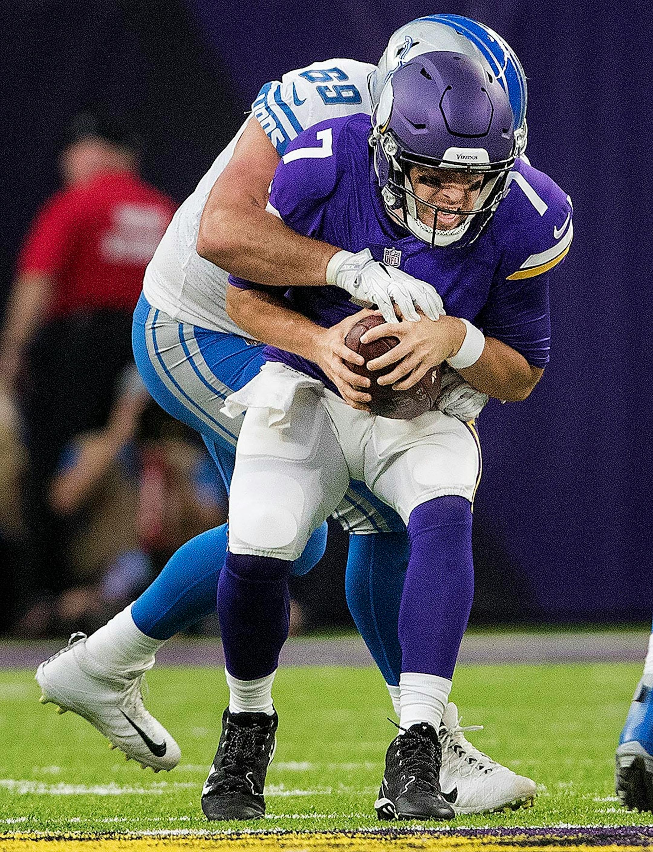 Minnesota Vikings Case Keenum (7) was sacked by Anthony Zettel (69) in the second quarter.