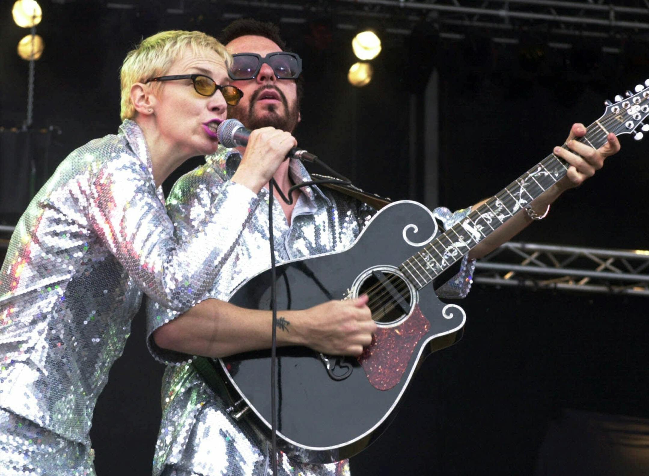 File- This June 10, 2000, file photo shows Annie Lennox, left, and Dave Stewart as the Eurythmics performing on stage at the Rock at the Ring three-day music festival at the Nuerburgring race circuit in Nuerburg, Germany. The Eurythmics are reuniting to pay tribute to the Beatles. The Recording Academy announced Monday Jan. 6, 2014, that Lennox and Stewart will perform as a duo for "The Night That Changed America: A Grammy Salute To The Beatles.î The event will tape at the Los Angeles Conve