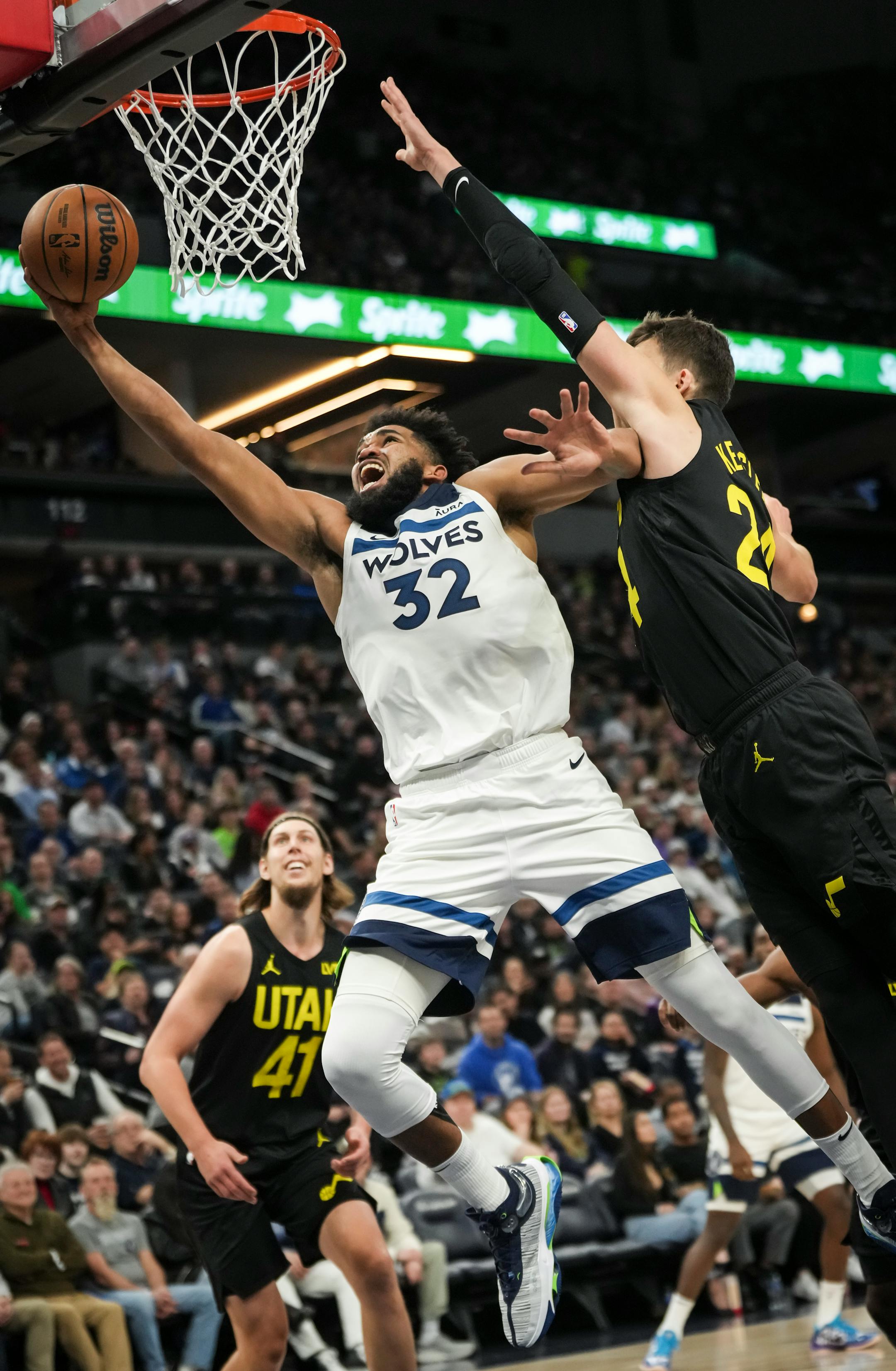 Minnesota Timberwolves center Karl-Anthony Towns (32) jumps for a shot in the second half. The Minnesota Timberwolves defeated the Utah Jazz 101-90 at Target Center on Thursday, Nov. 30, 2023 in Minneapolis, Minn. ] RENEE JONES SCHNEIDER • renee.jones@startribune.com