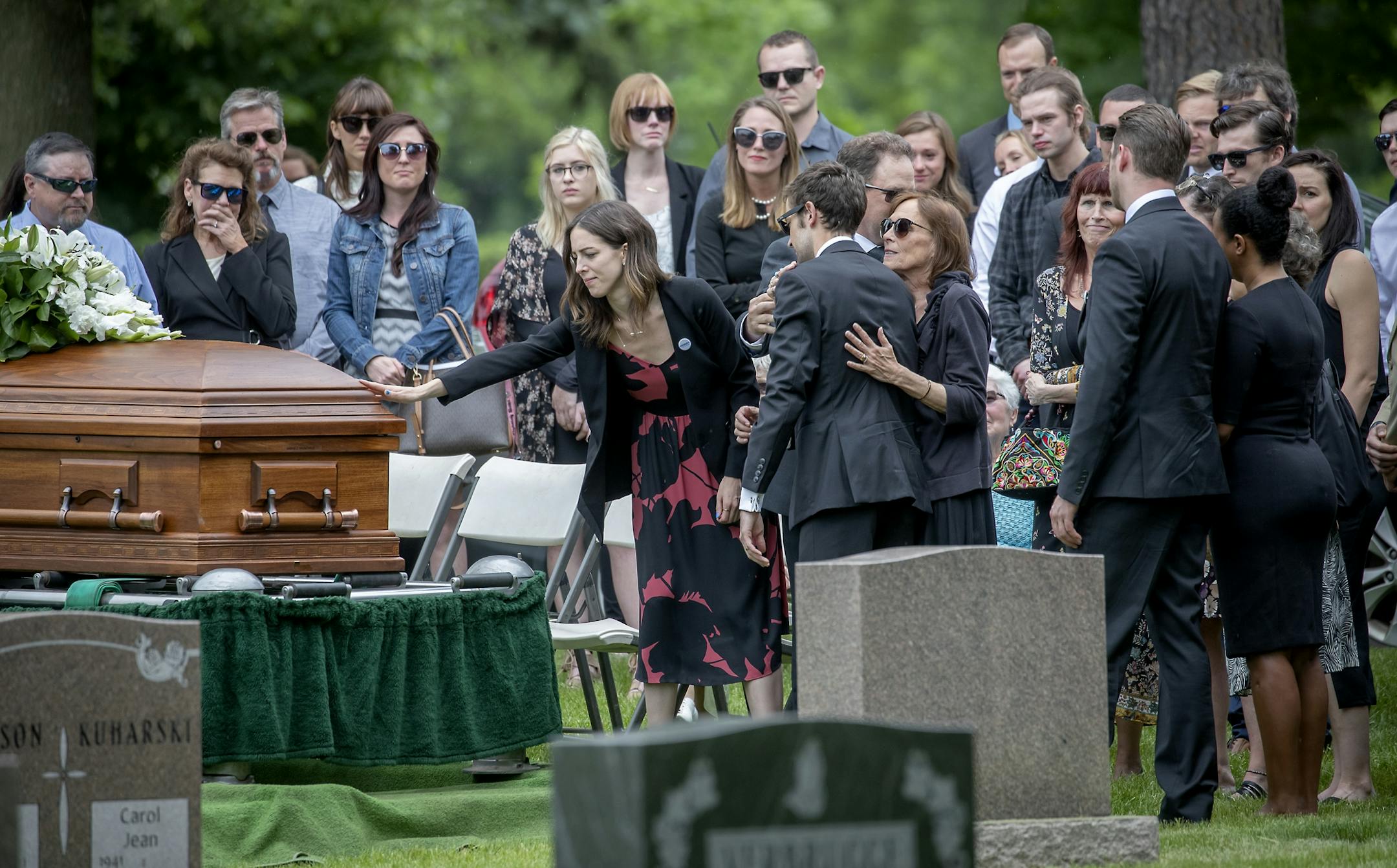 Gabriele Grunewald's sister Abigail Anderson, along with family and friends, bid farewell to the professional runner at the burial at Hillside Cemetery in Minneapolis, MN. After the interment family, friends, and supporters ran a one-mile run/jog/walk to honor Gabriele just outside the cemetery.