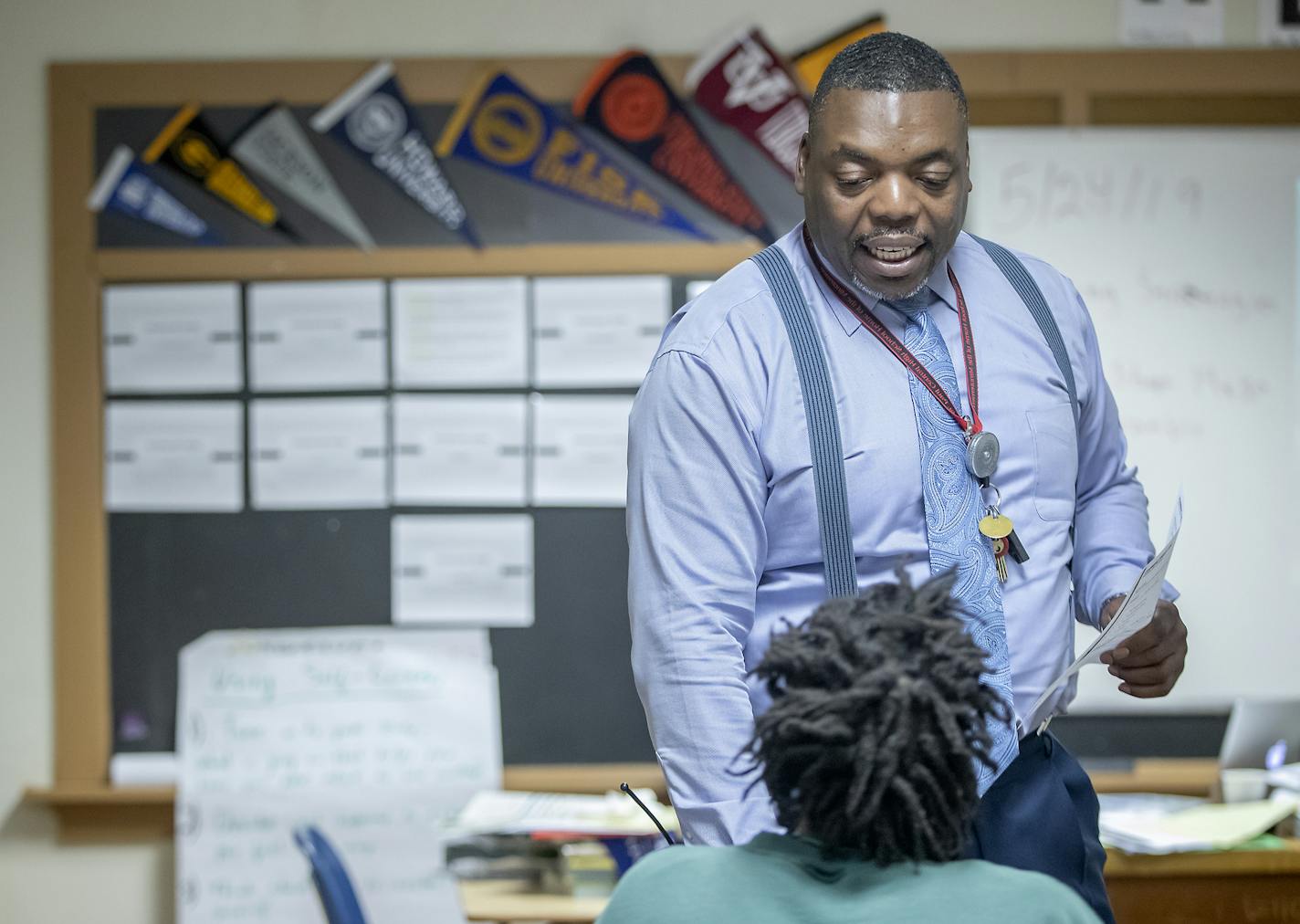 English teacher Roy Pierson explained an assignment at Boys Totem Town. A group of six young men will be the last class at the facility.