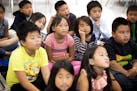Third-graders at the Community School of Excellence, a St. Paul charter school, listened in Hmong language class.
