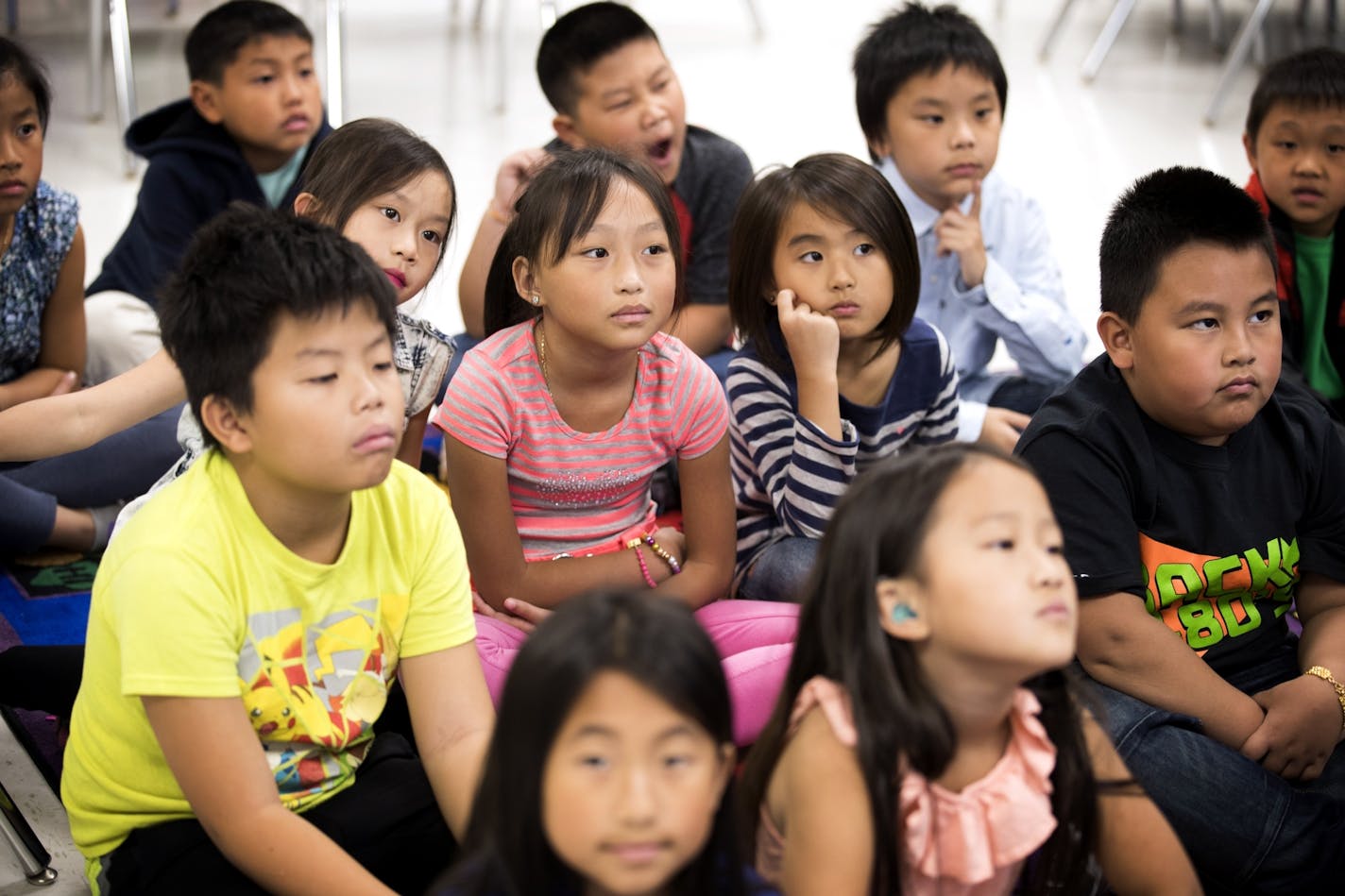 Third-graders at the Community School of Excellence, a St. Paul charter school, listened in Hmong language class.