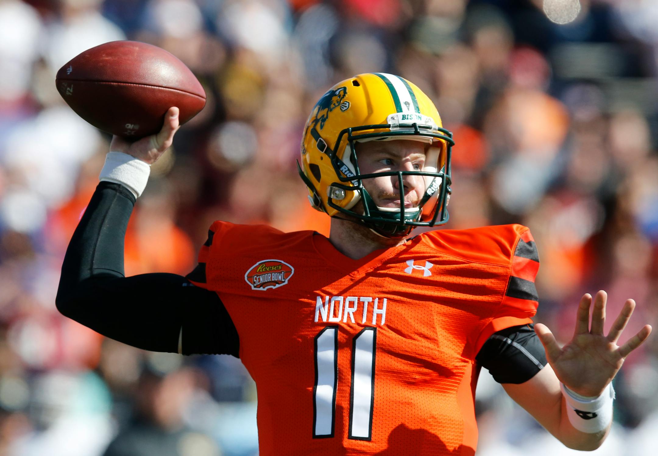 North Dakota State quarterback Carson Wentz sets back to pass during the Senior Bowl.