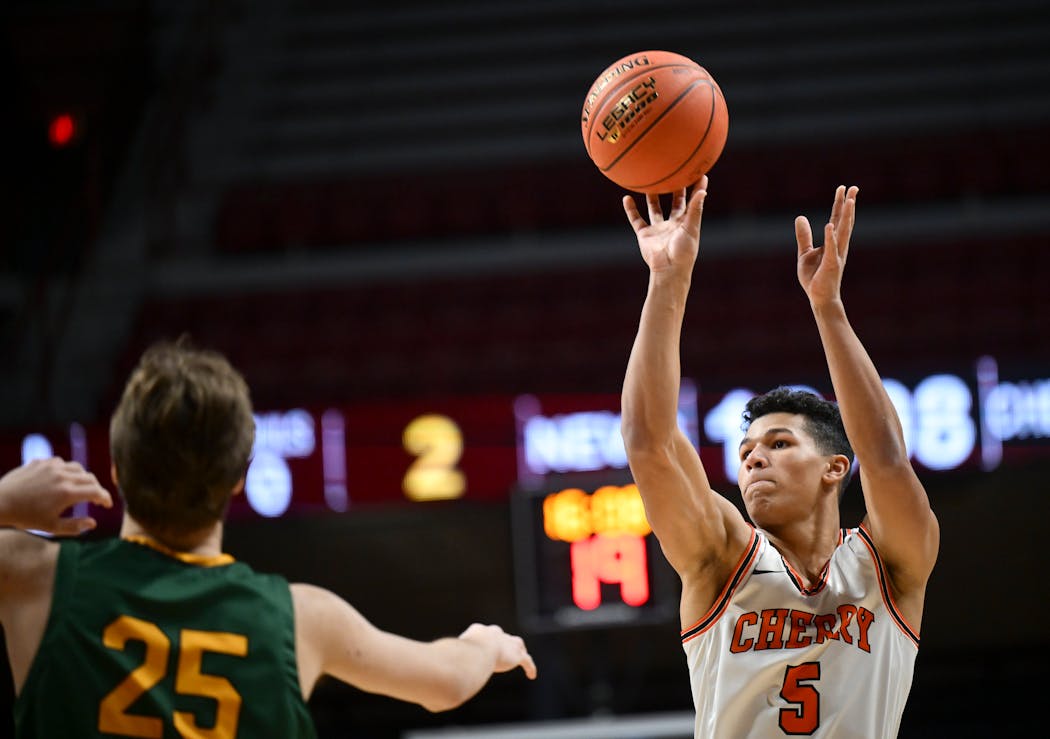 Noah Asuma (5) and brother Isaac each finished with 20 points, leading Cherry past Nevis 76-58 in Friday's Class 1A semifinals at Williams Arena.