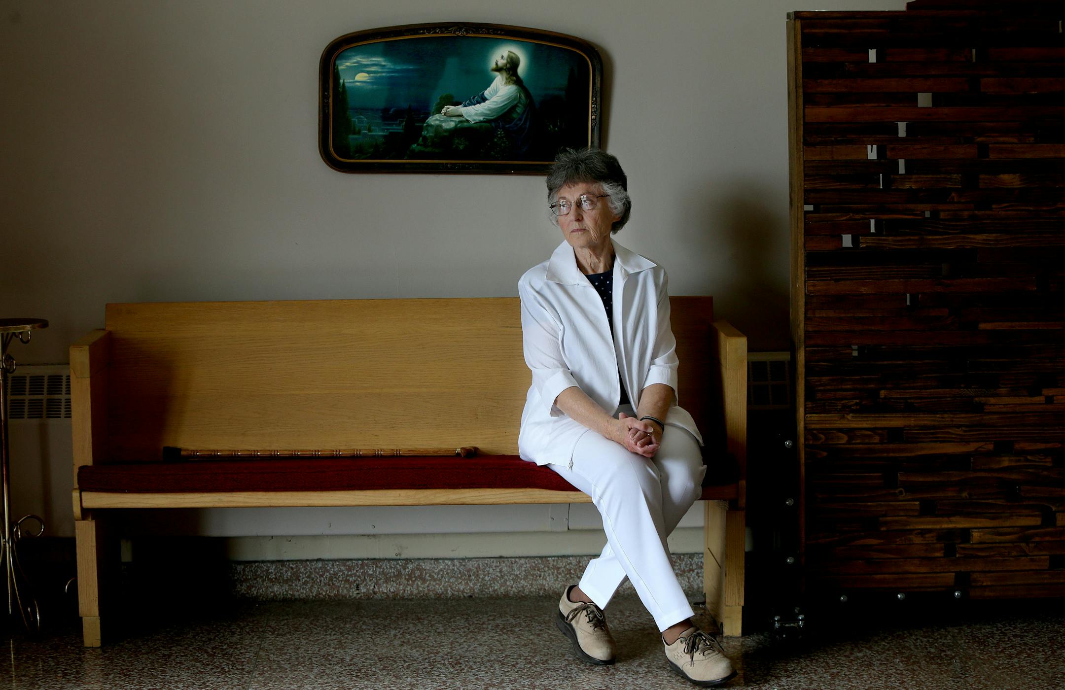 Phyllis Betzold, a member of Faith United Methodist Church for 65 years, sat on a church pew at the church, Wednesday, April 30, 2014 in Farmington, MN. For more than a century and a half, Faith United Methodist Church has been the place of worship for Farmington Methodists. But next year, the old church will close its doors and start a new site aimed at millenials. The closing of the 160-year-old church follows in line with the Minnesota United Methodist Church's goal to rebrand their religion