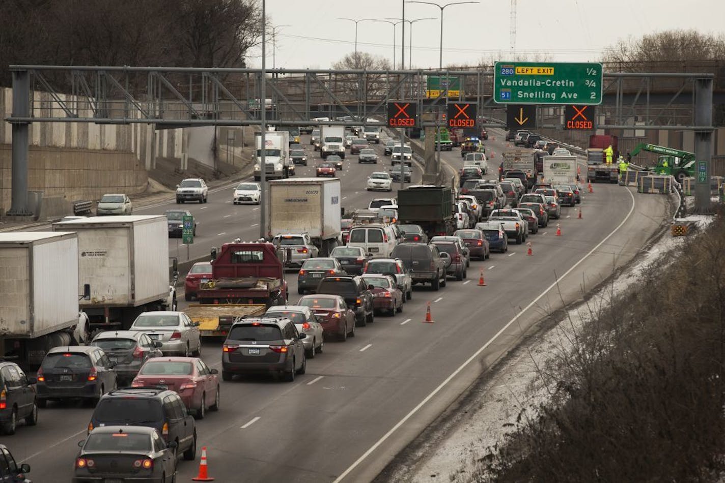 Traffic is jammed on eastbound I-94, seen from the Franklin Avenue overpass, after a van traveling eastbound on I-94 broke down and caught fire in Minneapolis in the late morning on Tuesday, December 2, 2014.