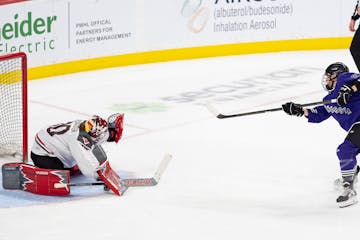 PWHL Minnesota forward Taylor Heise beats Ottawa goaltender Sandra Abstreiter for the winning goal in the shootout of Minnesota's 4-3 victory at Xcel 