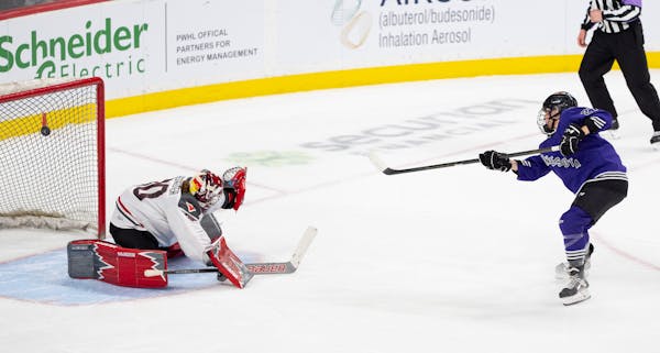 PWHL Minnesota forward Taylor Heise beats Ottawa goaltender Sandra Abstreiter for the winning goal in the shootout of Minnesota's 4-3 victory at Xcel 