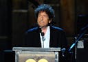FILE - In this Feb. 6, 2015 file photo, Bob Dylan accepts the 2015 MusiCares Person of the Year award at the 2015 MusiCares Person of the Year show in