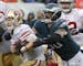 Philadelphia Eagles defensive end Chris Long reaches for San Francisco 49ers quarterback C.J. Beathard during an NFL football game, Sunday, Oct. 29, 2
