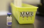 FILE - This Feb. 6, 2015, file photo shows a measles, mumps and rubella vaccine on a countertop at a pediatrics clinic in Greenbrae, Calif. The U.S. h