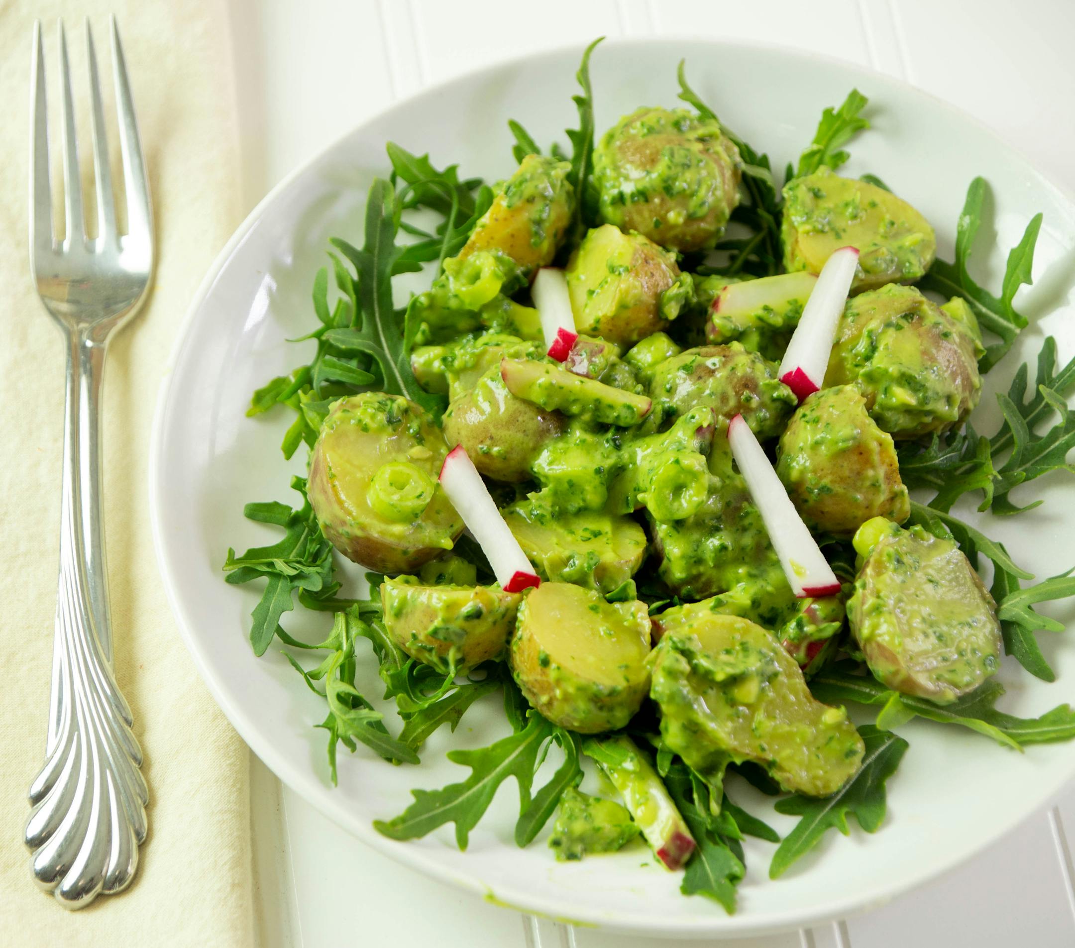 New Potato Salad With Creamy Arugula and Avocado Dressing.