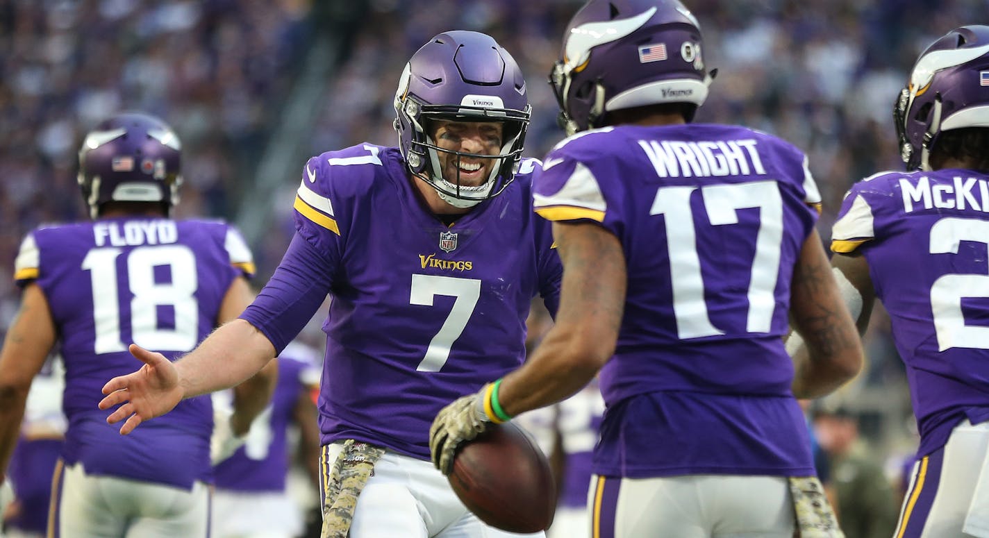 Minnesota Vikings quarterback Case Keenum (7) celebrated Adam Thielen touchdown with receiver Jarius Wright (17) at U.S. Bank Stadium Sunday November 19, 2017 in Minneapolis, MN.] JERRY HOLT &#xef; jerry.holt@startribune.com