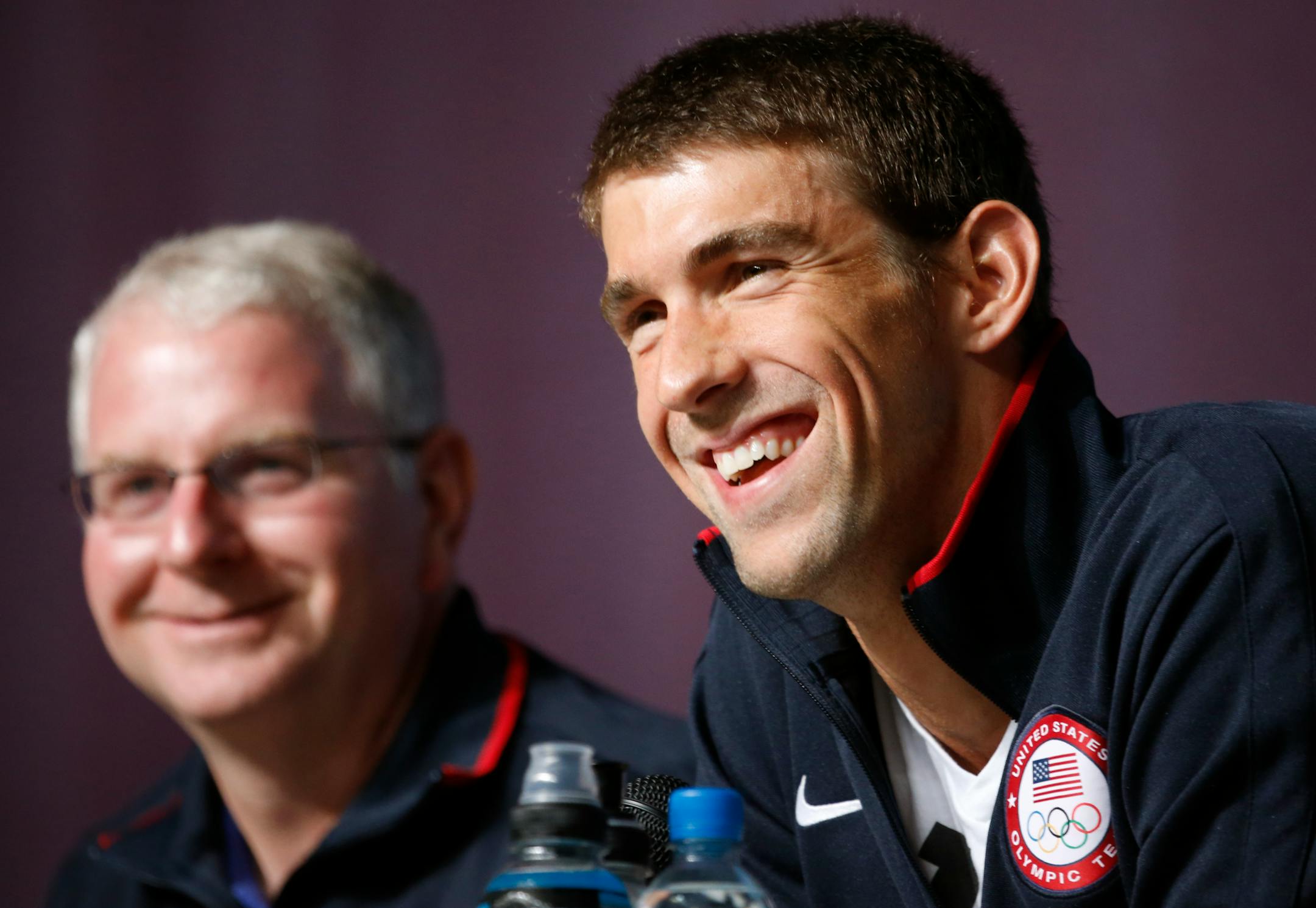 After Michael Phelps set the record for most Olympic medals, President Obama tweeted, "Congrats to Michael Phelps for breaking the all-time Olympic medal record. You've made your country proud. -bo" Phelps wrote back: "Thank you Mr. President!! It's an honor representing the #USA !! The best country in the world!!" Phelps is pictured with coach Bob Bowman, left.