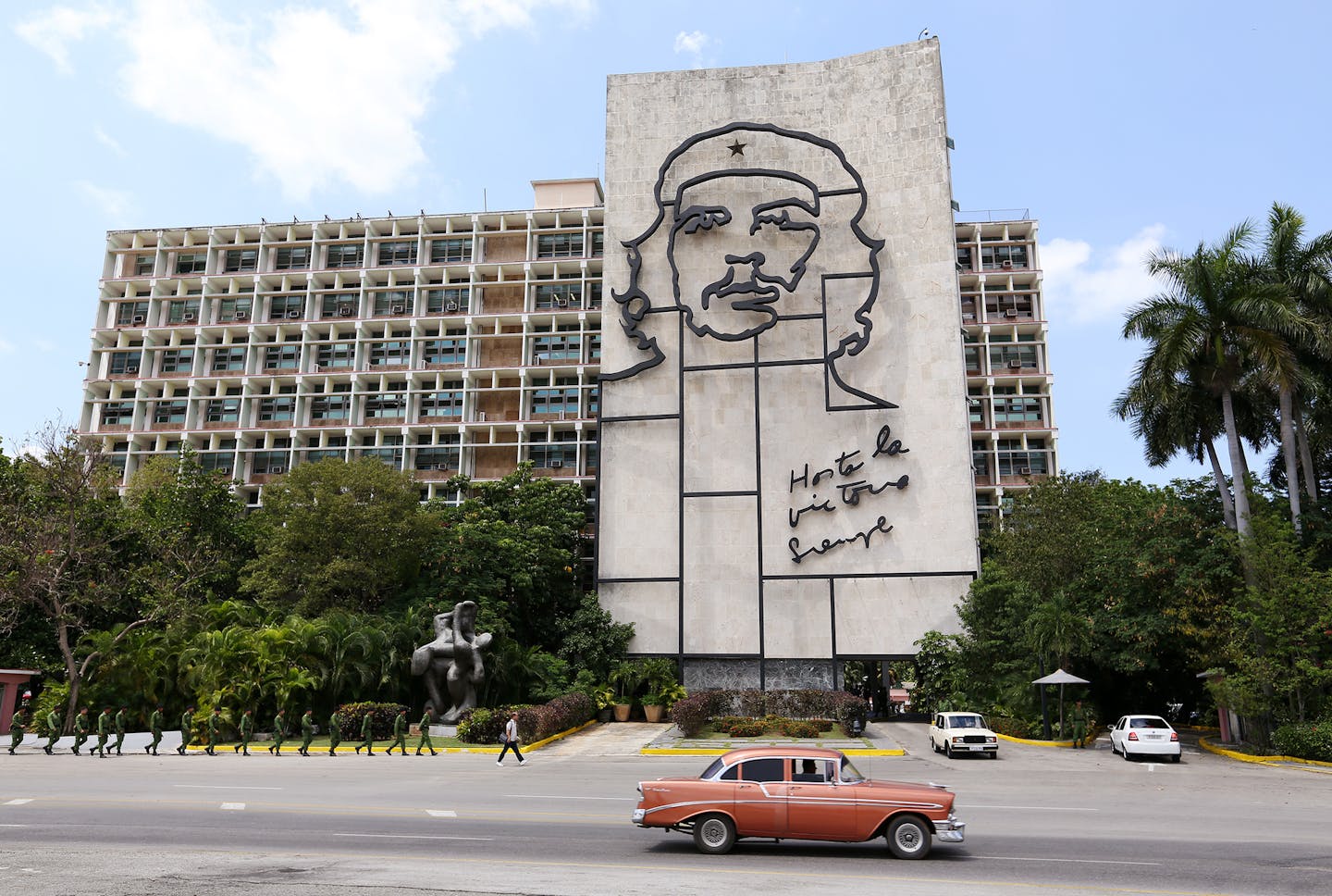 Classic cars and Che Guevara grace the Plaza de la Revoluci&#xf3;n in Havana, Cuba.