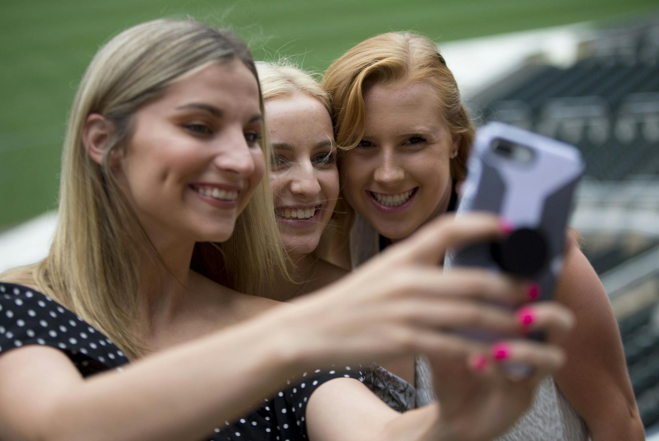 (From left) Nina Boguslawski, Tess Matalamaki and Caitlyn Schmitt from the Eastview Dance Team take a selfie together at Target Field. ] ALEX KORMANN &#x2022; alex.kormann@startribune.com The first All-Metro Sports Awards were hosted by the Star Tribune at Target field on Tuesday evening. High school athletes from across the area were invited to partake in an evening of festivities and food to celebrate their accomplishments. Awards were handed out for different categories including sweetest pla