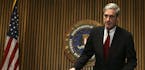 FILE -- FBI Director Robert Mueller III before a news conference on Capitol Hill, in Washington, March 9, 2007. The Justice Department has appointed M