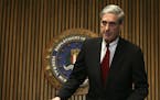 FILE -- FBI Director Robert Mueller III before a news conference on Capitol Hill, in Washington, March 9, 2007. The Justice Department has appointed M