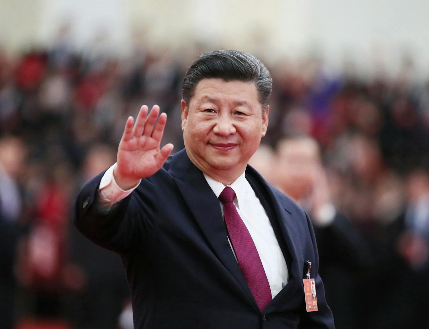 Chinese President Xi Jinping waves to deputies at the 13th National People's Congress in Beijing on Tuesday, March 20, 2018. (Lan Hongguang/Xinhua/Sipa USA/TNS)