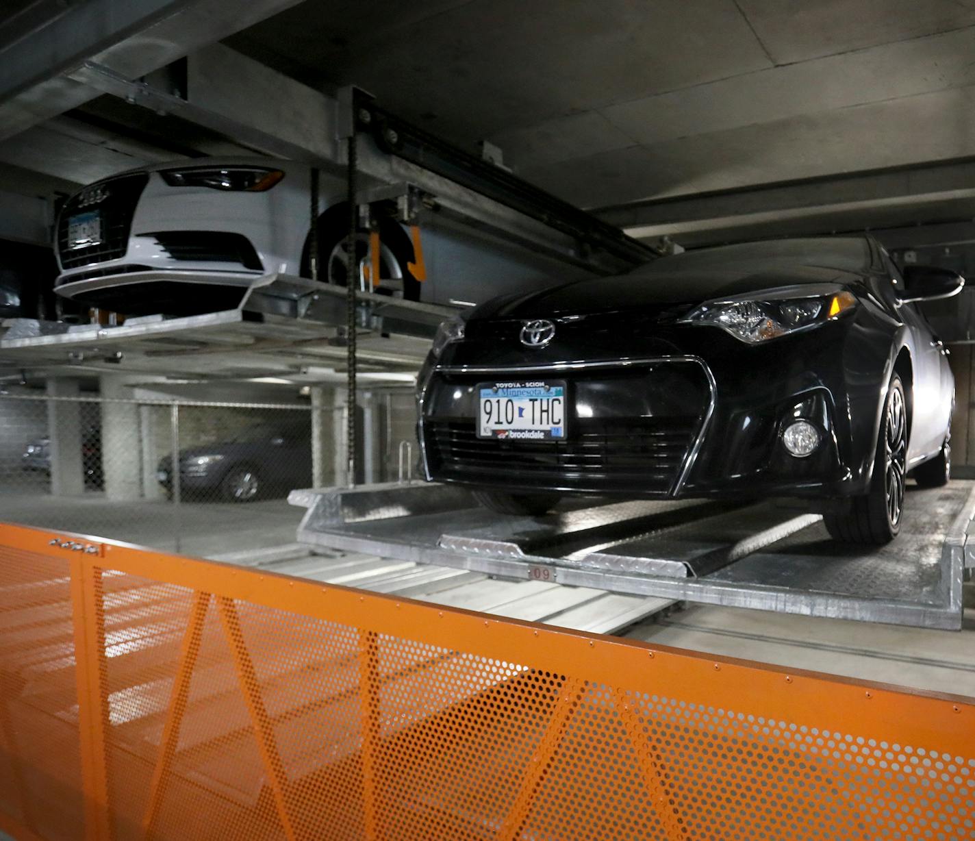 The parking garage at the M on Hennepin features the car matrix parking system that can shuffle parked cars on its two levels, allowing for residents to have 24/7 access to their vehicles and seen Thursday, Sept. 27, 2018, in Minneapolis, MN.] DAVID JOLES &#xef; david.joles@startribune.com When Schafer Richardson was doing site prep for an apartment building that would replace the Nye's Polonaise Room in Minneapolis, they ran into an unexpected problem: A thick deposit of bedrock that would make