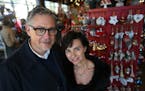 Owners of Patina, Christine Ward and Rick Haase stand among the holiday displays at one of their stores in Minneapolis.