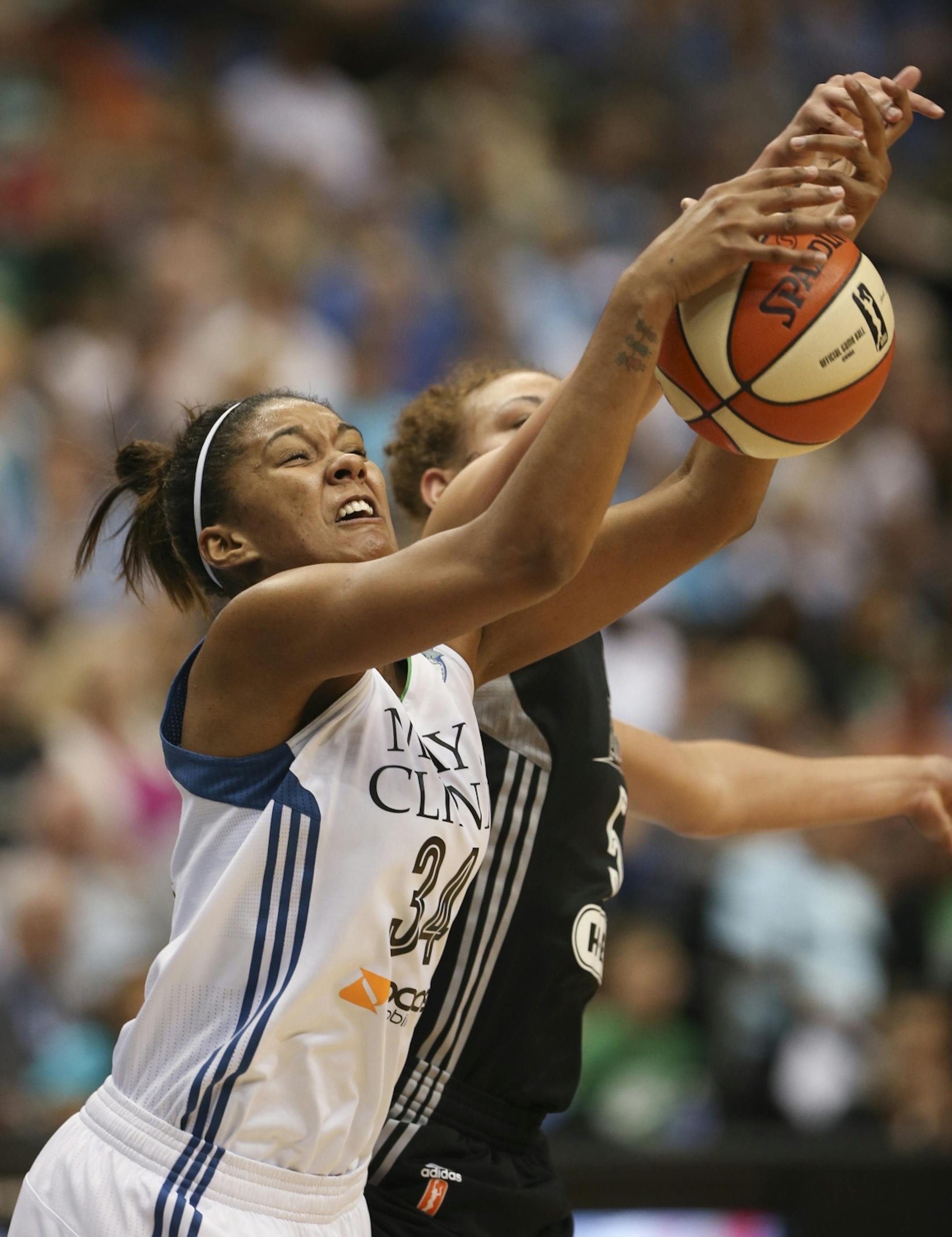 Minnesota's Damiris Dantas fought the Stars' Sydney Colson for a rebound in the fourth quarter Sunday night at Target Center.